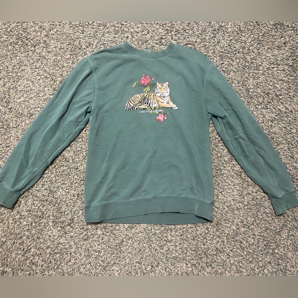 Comfy “Love Your Enemies” Green Sweatshirt.